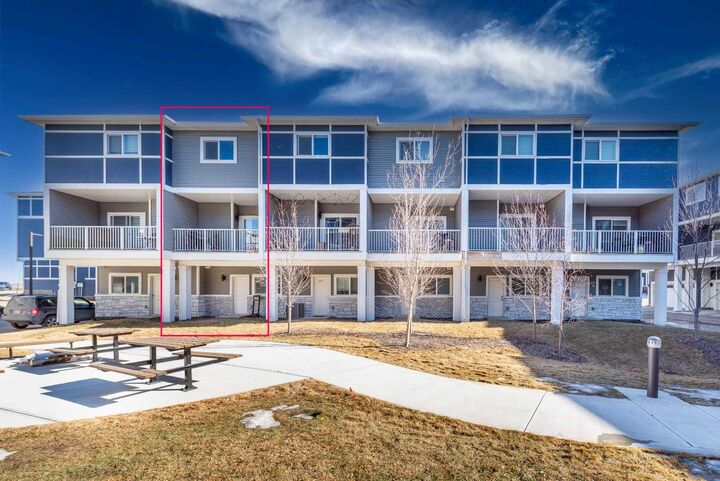 Property Photo: 33 Merganser Drive W 902 AB T1X 2S3