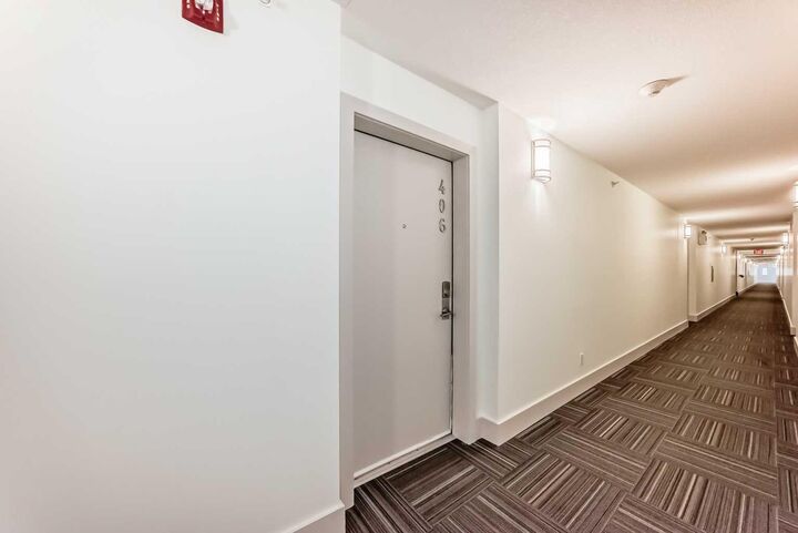 Property Photo:  4303 1 Street NE 406  AB T2E 7M3 