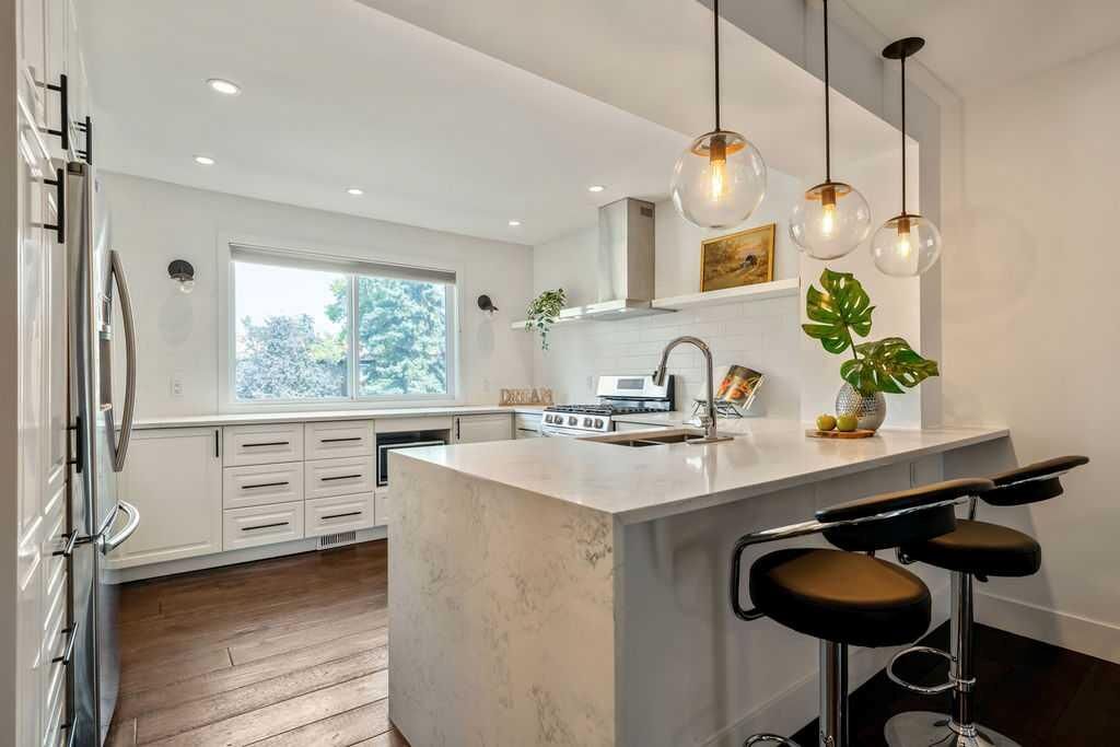 Property Photo:  210 86 Avenue SE 92  AB T2H 1N6 