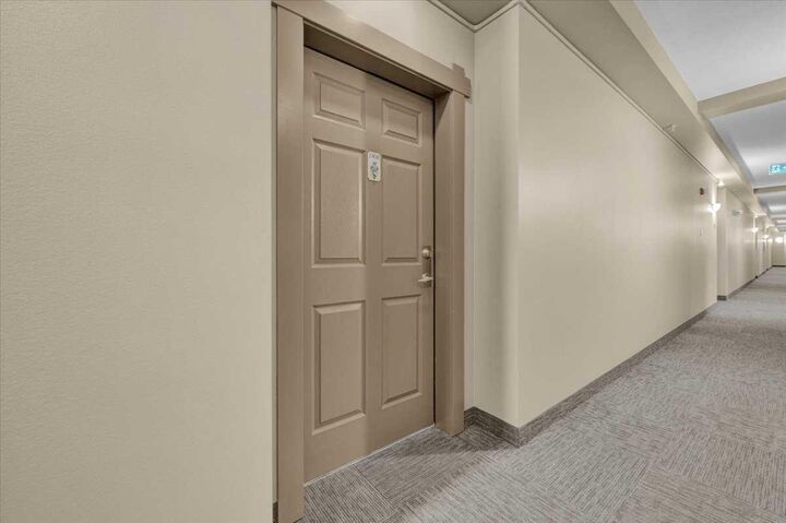 Property Photo:  92 Crystal Shores 2408  AB T1S 2M9 