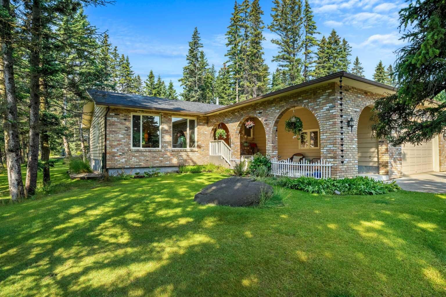 Property Photo:  63 Wolf Drive  AB T3Z 1A3 
