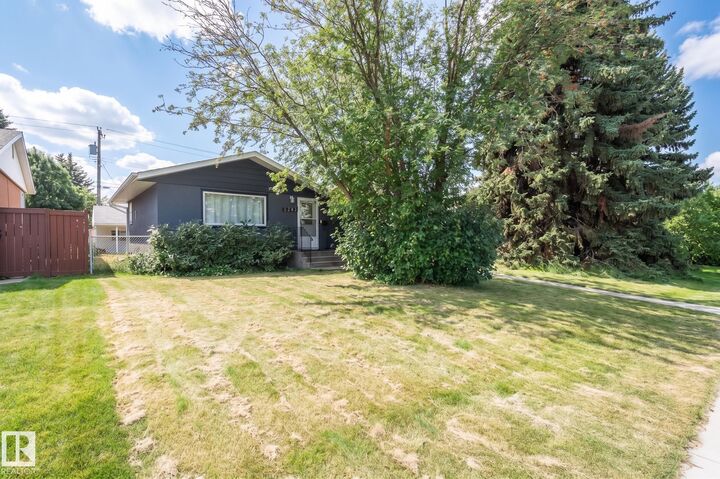 Property Photo:  5207 103 Avenue NW  AB T6A 0T1 