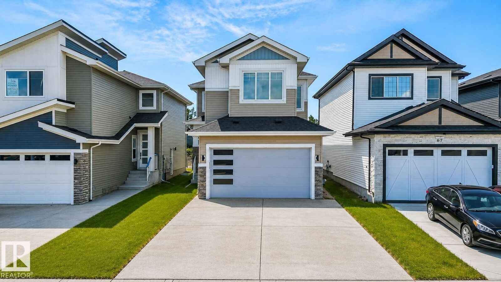 Property Photo:  65 Silverstone Drive  AB T7Z 0E8 
