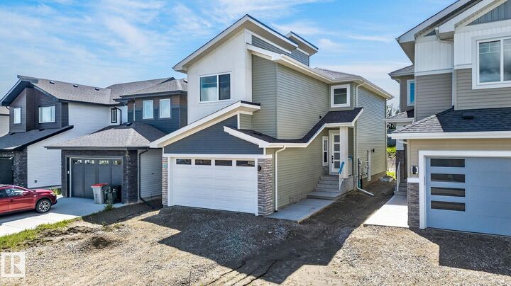 Property Photo:  63 Silverstone Drive  AB T7Y 0E8 