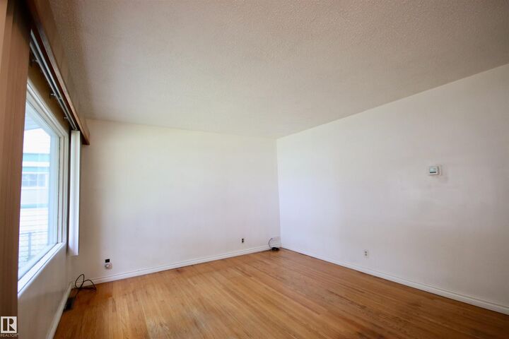 Property Photo:  12936 115 Street NW  AB T5E 5G1 