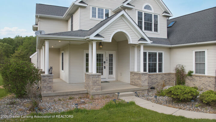 Property Photo:  141 Twin Ponds Lane  MI 48864 