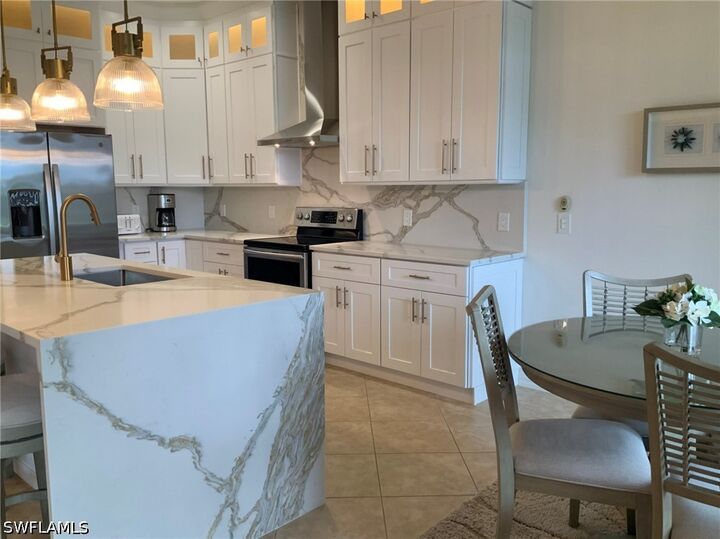 Property Photo:  5583 Lago Villaggio Way  FL 34104 