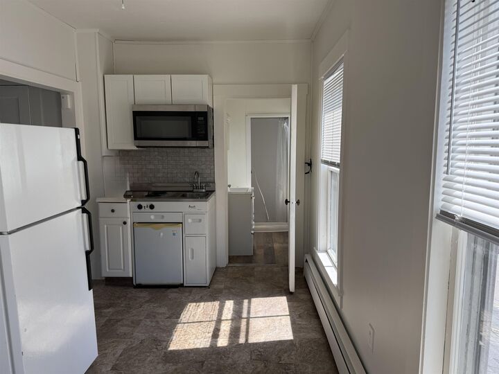 Property Photo:  1073 Union Avenue  NH 03246 