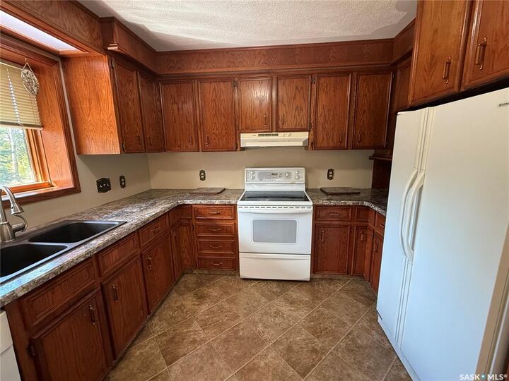 Property Photo:  306 20th Avenue NW  SK S6V 5R3 