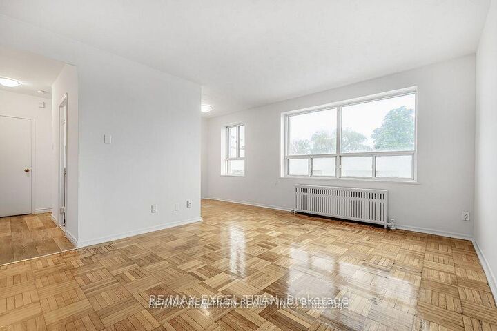 Property Photo:  156 Kingston Road 306  ON M4L 1S7 