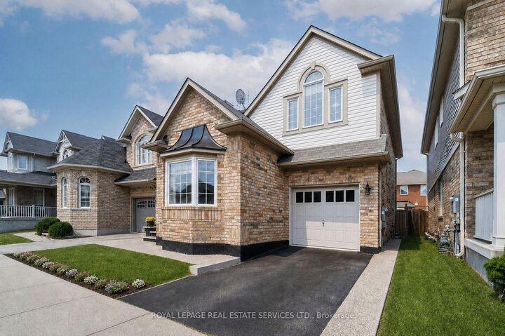 Property Photo:  243 McDougall Cross N/A  ON L9T 0P3 