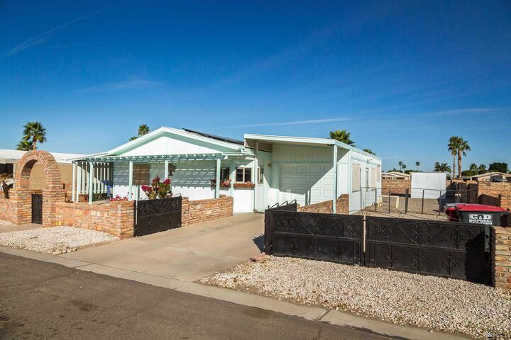 Property Photo: 11428 E 37 St AZ 85367