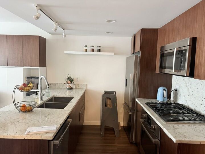 Property Photo:  8699 Hazelbridge Way 8xx  BC V6X 0T4 