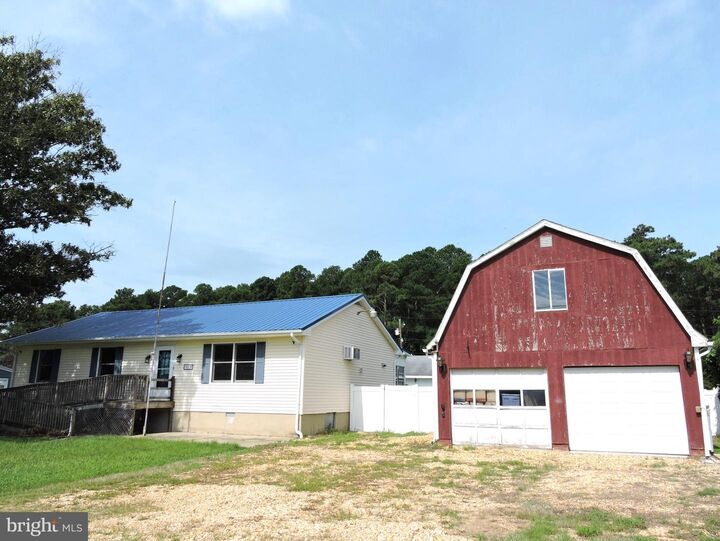 Property Photo:  28258 Basin Road  DE 19966 