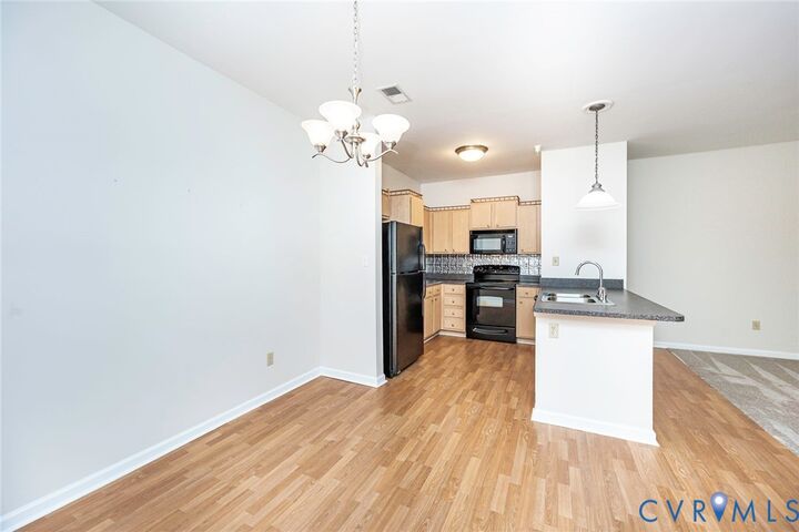 Property Photo:  704 Bristol Village Drive 104  VA 23114 