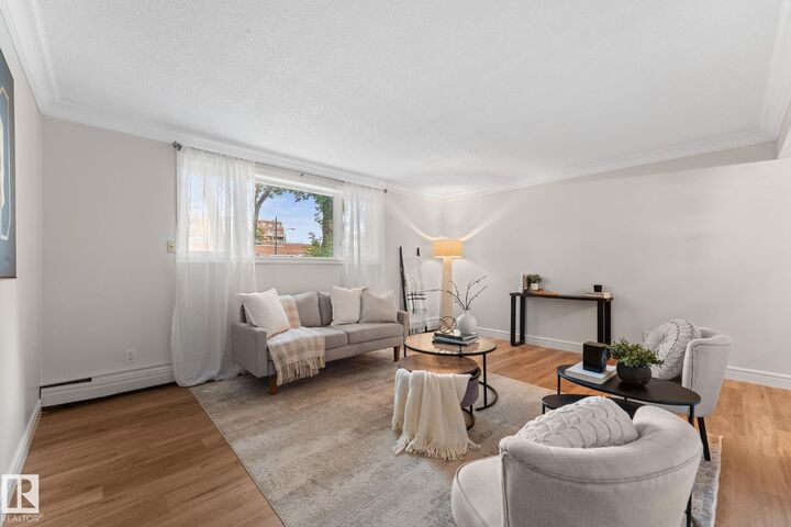 Property Photo:  10735 81 Avenue NW 106  AB T6E 1Y2 