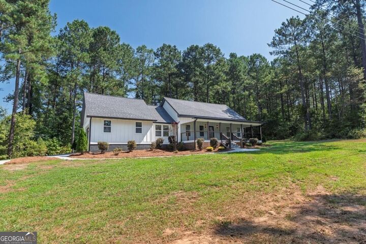 Property Photo:  1344 Puckett Road  GA 30183 