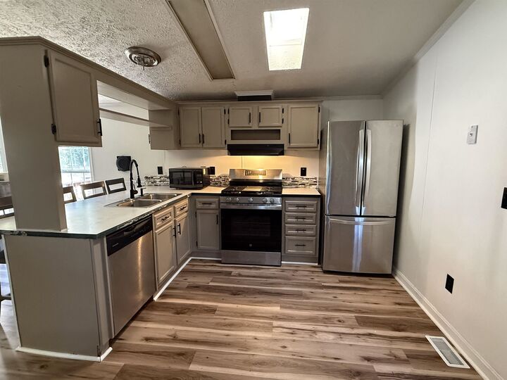 Property Photo:  18 Tee Dee Drive  NH 03220 