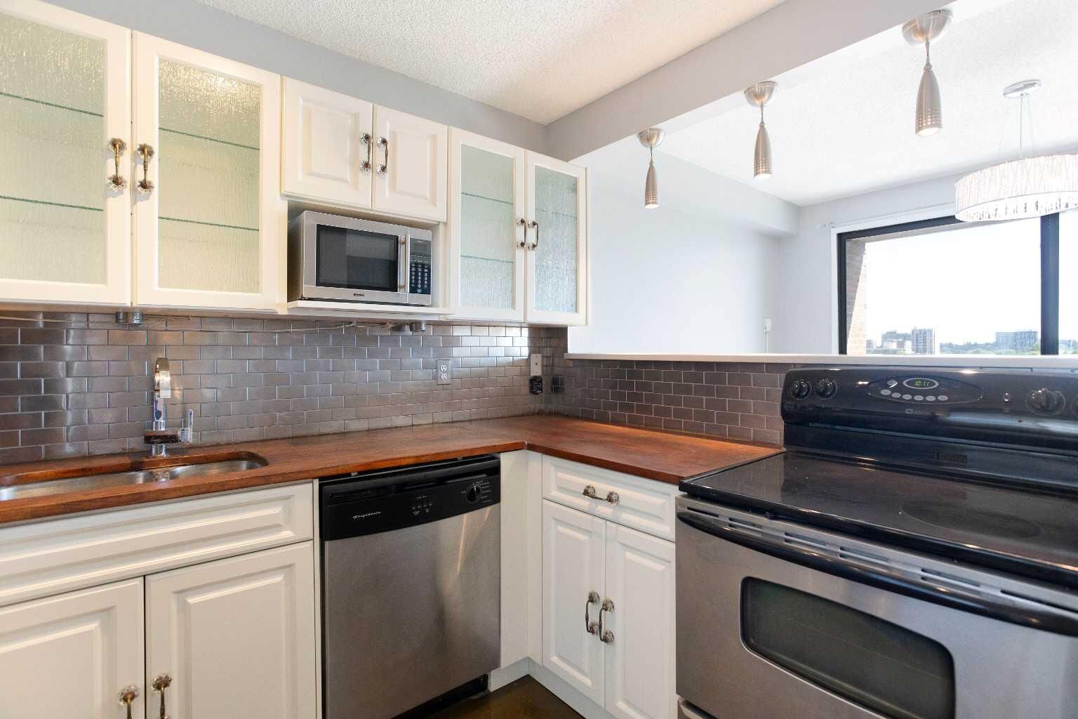 Property Photo:  1414 5 Street SW 803  AB T2R 0Y8 