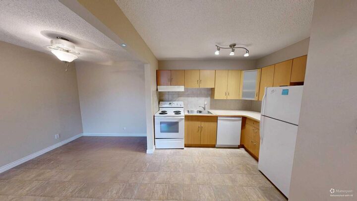 Property Photo:  4210 20 Avenue S 204  AB T1K 4X9 