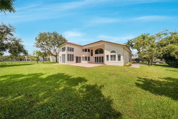 Property Photo: 11406 Canyon Maple Blvd FL 33330