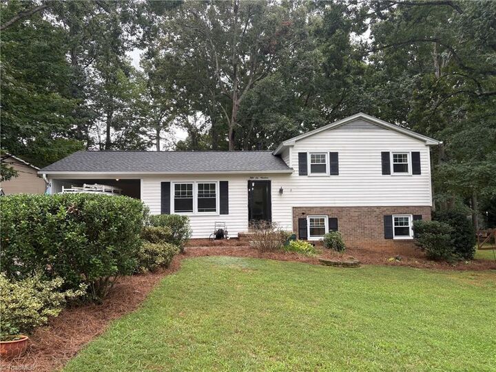 Property Photo:  5619 Virgilwood Drive  NC 27409 