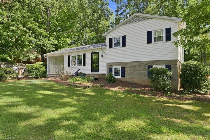 Property Photo: 5619 Virgilwood Drive NC 27409