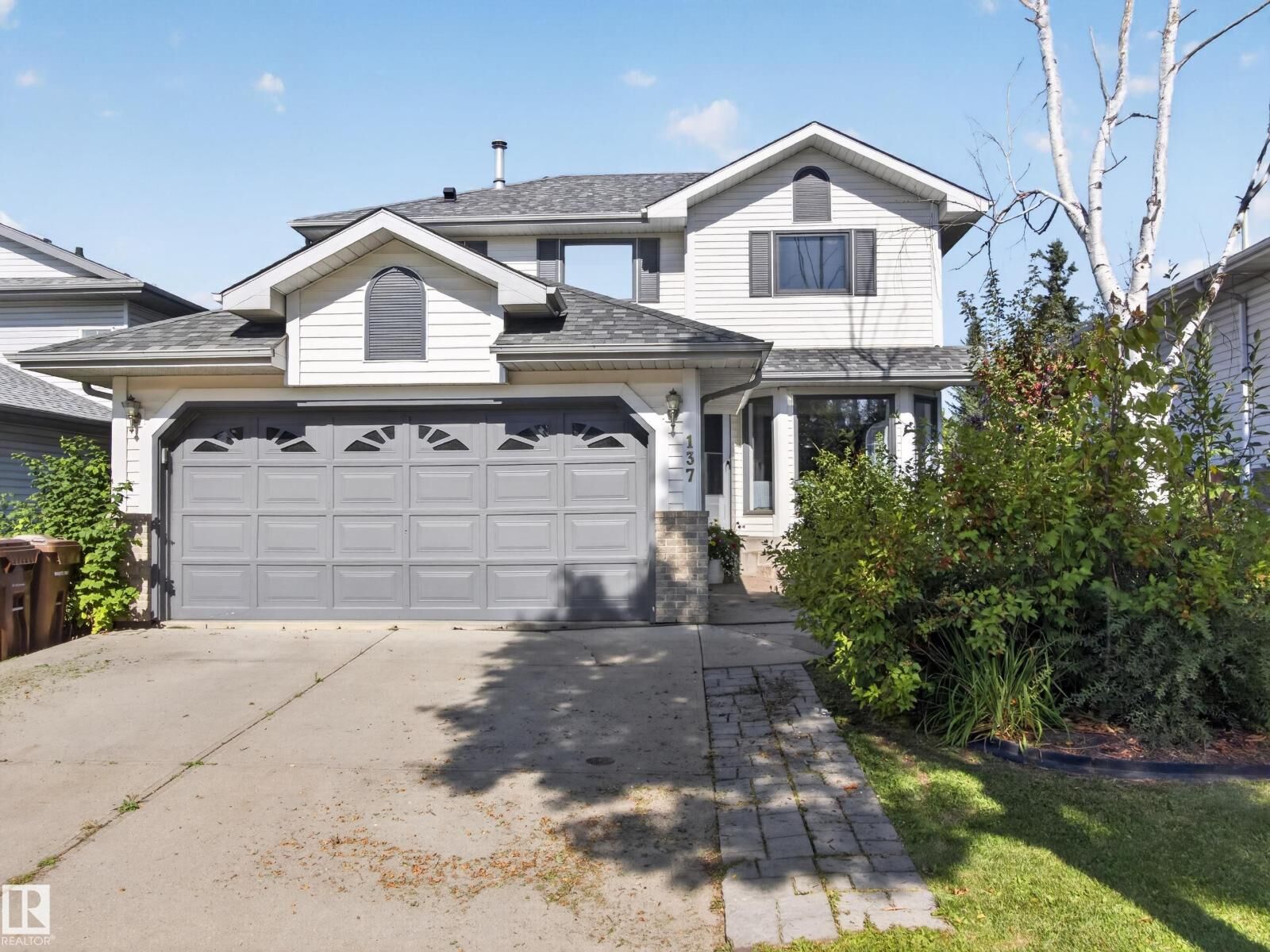Property Photo: 137 Deer Ridge Dr AB T8N 6G7