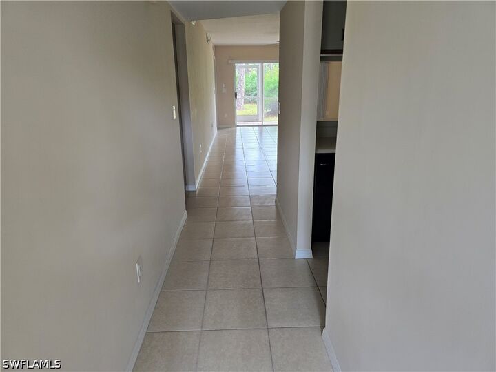Property Photo:  5750 Woodmere Lake Circle H101  FL 34112 