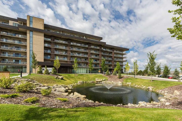 Property Photo:  102 Scenic Drive N 214  AB T1H 5L9 