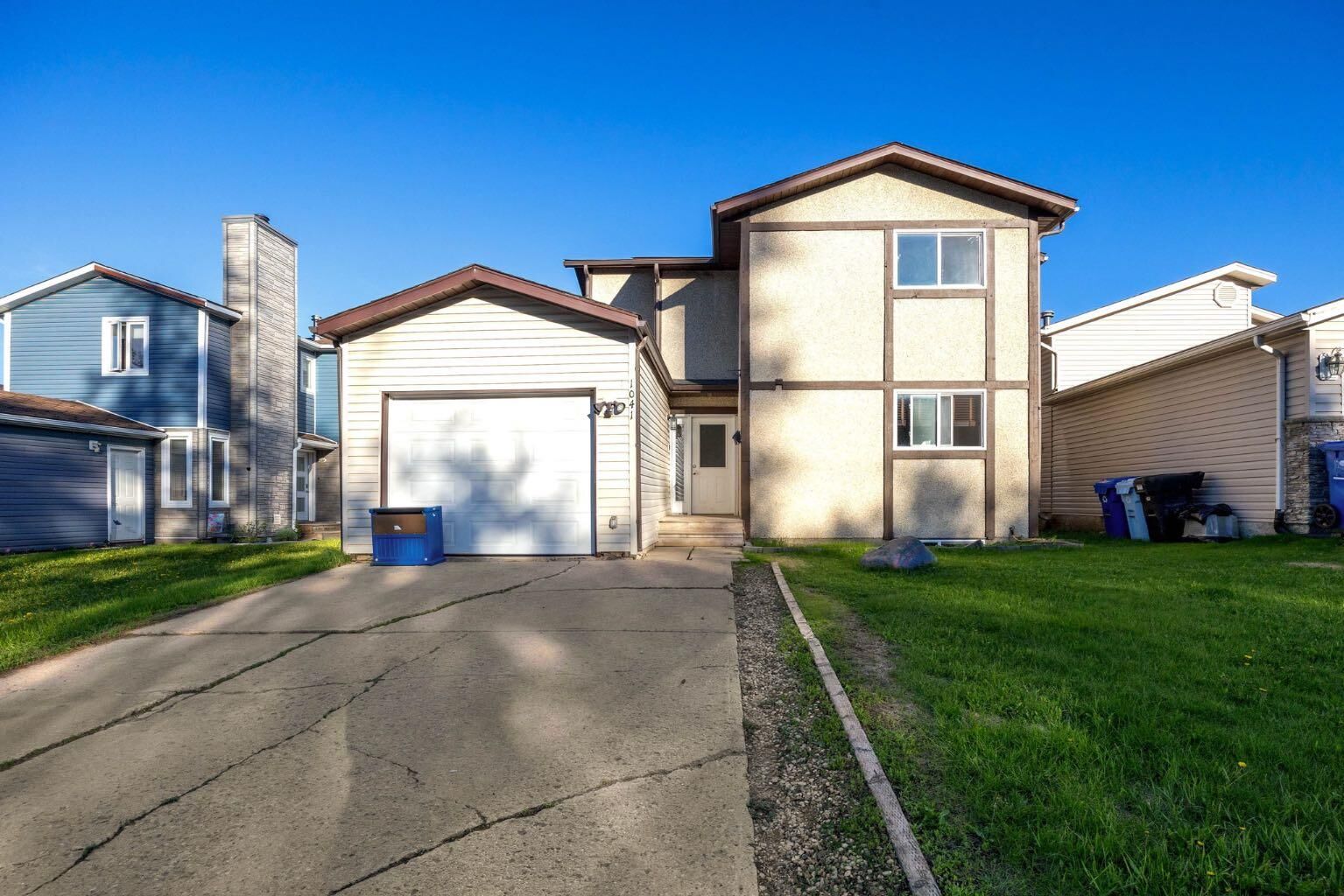 Property Photo:  1041 Timberline Drive  AB T9K 1A8 