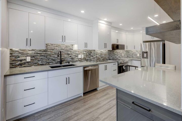 Property Photo:  6440 4 Street NW 55  AB T2K 1B8 