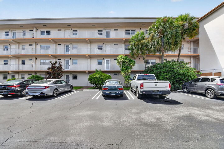 Property Photo:  230 NE 26th Avenue 412  FL 33435 