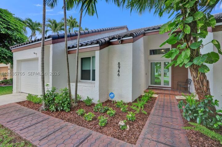 Property Photo: 8946 SW 150th Ct Cir E FL 33196