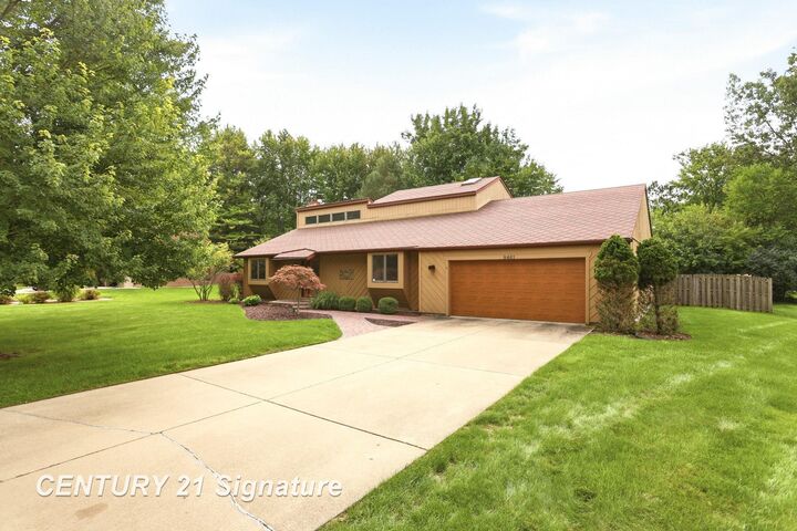 Property Photo:  8461 W Glencarin Drive  MI 48609 