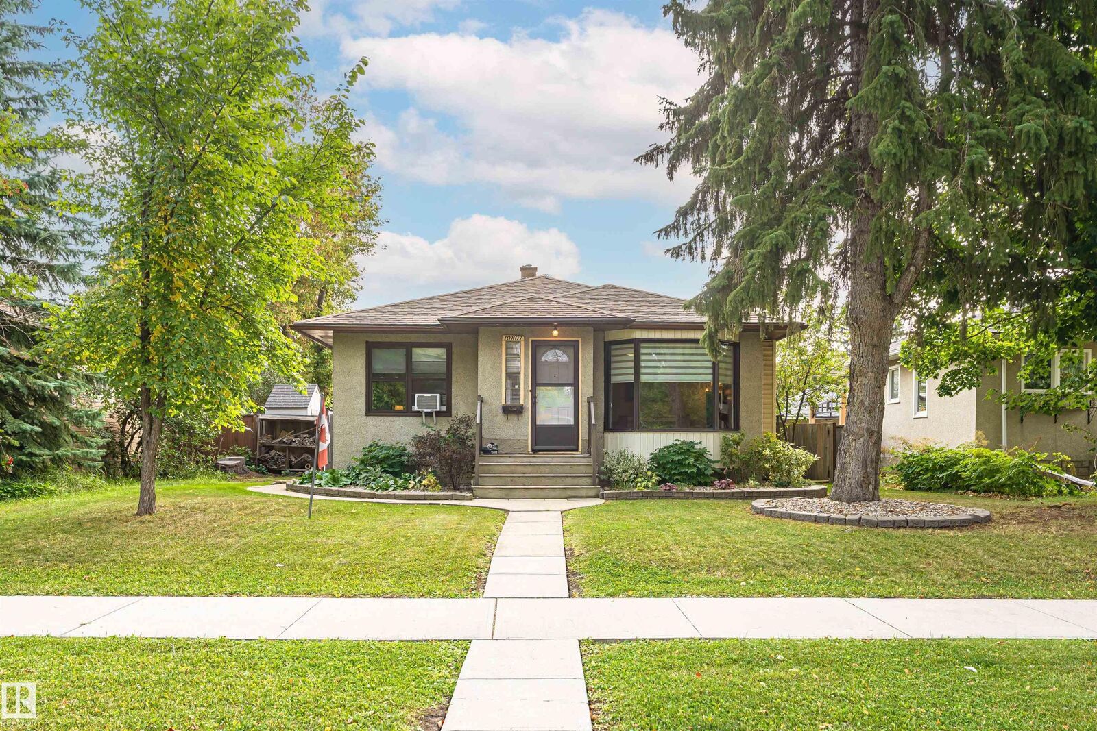 Property Photo:  10807 136 Street NW  AB T5M 1M1 