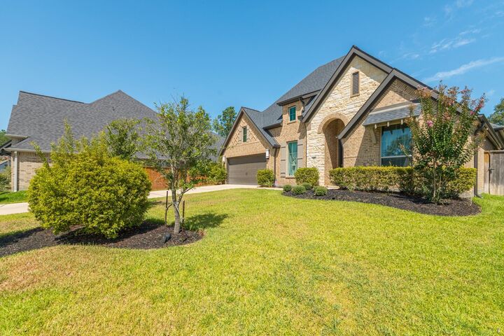 Property Photo:  413 Brackendale Court  TX 77316 