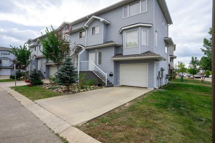 Property Photo:  104 Loutit Road 307  AB T9K 0A2 