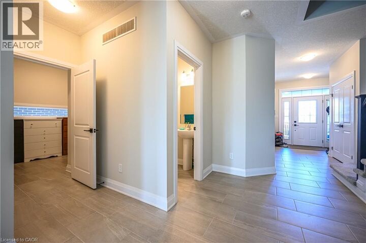Property Photo:  318 Chokecherry Crescent  ON N2V 0H1 
