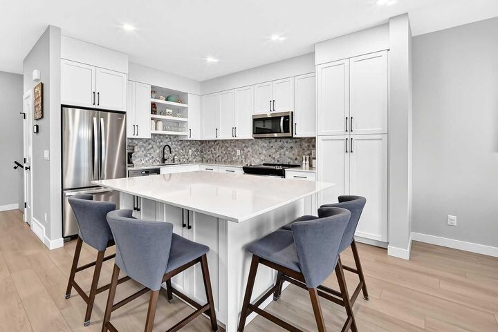 Property Photo:  203 Greenwich Drive NW  AB T3B 6N9 