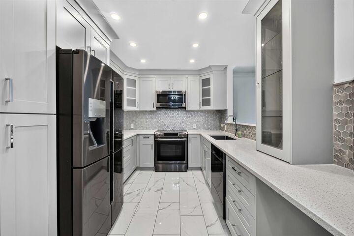 Property Photo:  13680 84 Avenue 404  BC V3W 0T6 