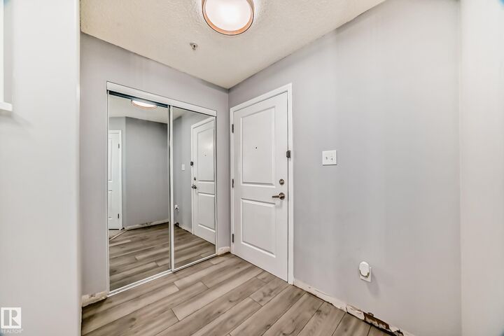 Property Photo:  11325 83 Street NW 112  AB T5B 4W7 