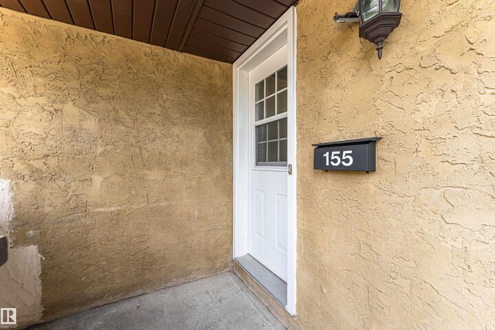 Property Photo:  155 Woodborough Way NW  AB T5Y 1N2 