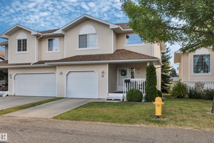 Property Photo:  6608 158 Avenue NW 13  AB T5Z 3H1 