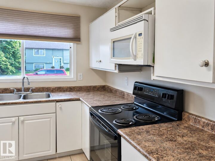 Property Photo:  14411 31 Street NW  AB T5Y 1Z1 