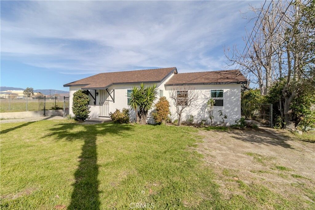 Property Photo: 9023 Olive CA 92335