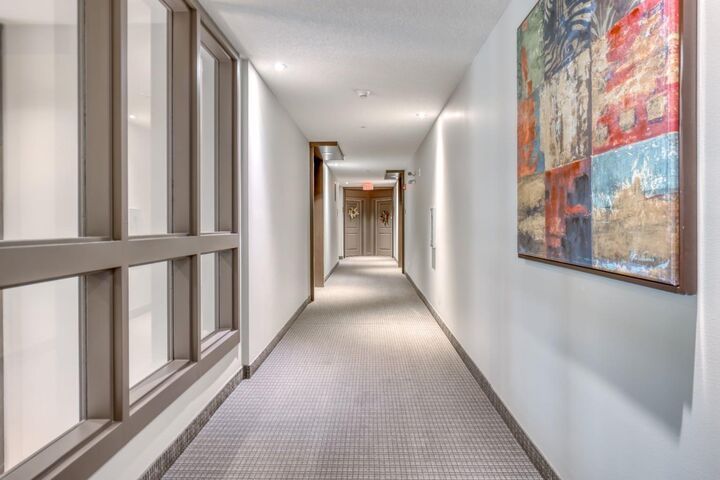 Property Photo:  15 Sunset Square 2203  AB T4C 0E7 