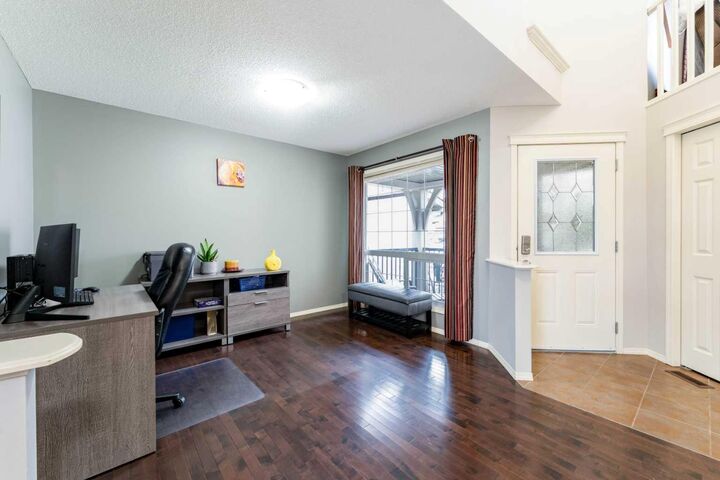 Property Photo:  595 Everbrook Way SW  AB T2Y 0E7 