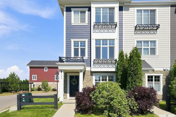 Property Photo:  703 Meadows Boulevard  SK S7V 0L3 
