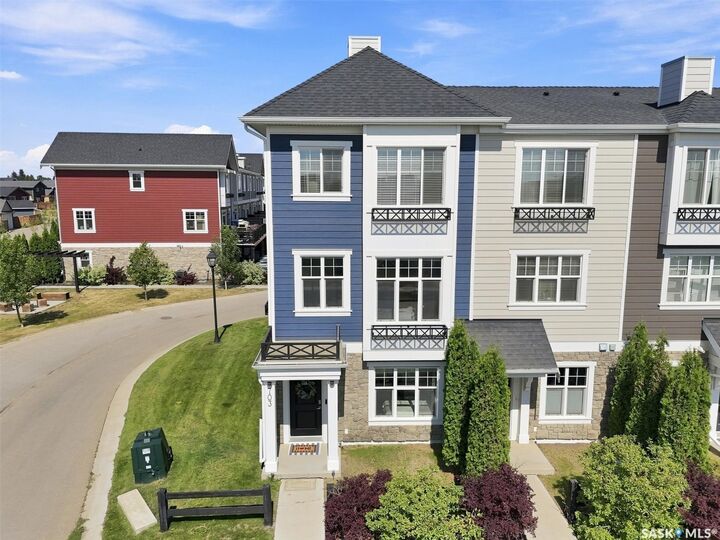 Property Photo: 703 Meadows Boulevard SK S7V 0L3